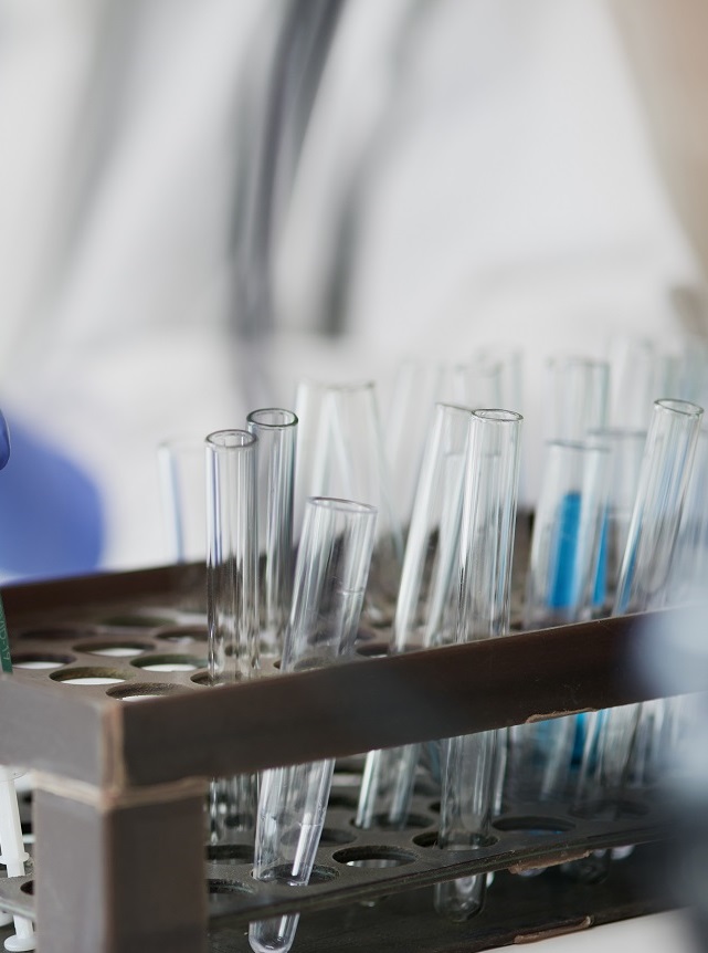 Desk at laboratory with test tubes